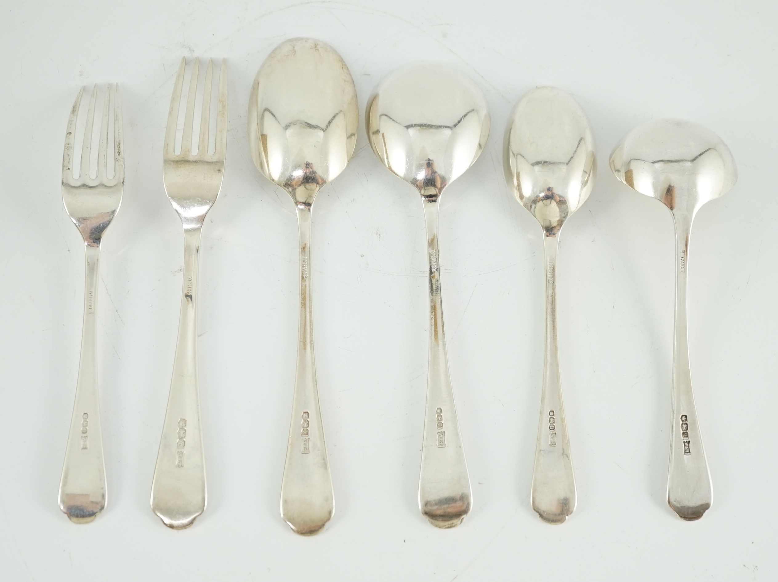 A part canteen of George V and later silver flatware by Walker & Hall